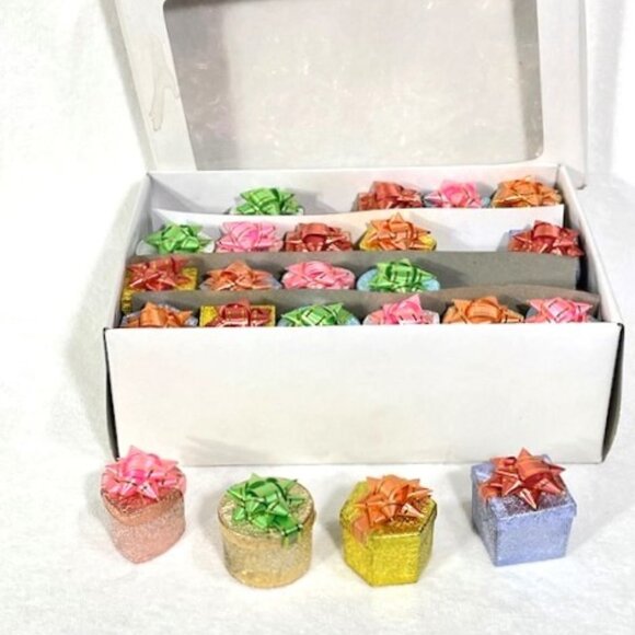 Set of 47 assorted metallic ring gift boxes new in box.